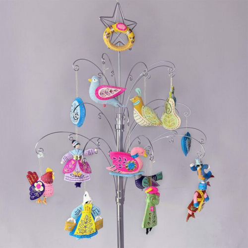 Set of Christmas tree decorations representing the 12 days of Christmas in pastel shades of felt