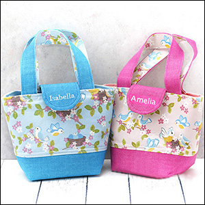 2 toy tote bags in pink and blue versions