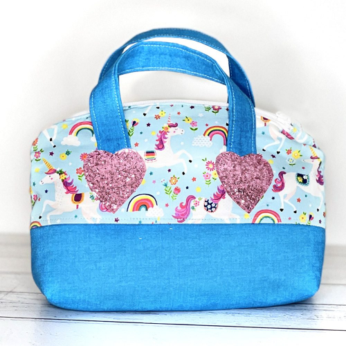 Childs toy handbag in blue with unicorns