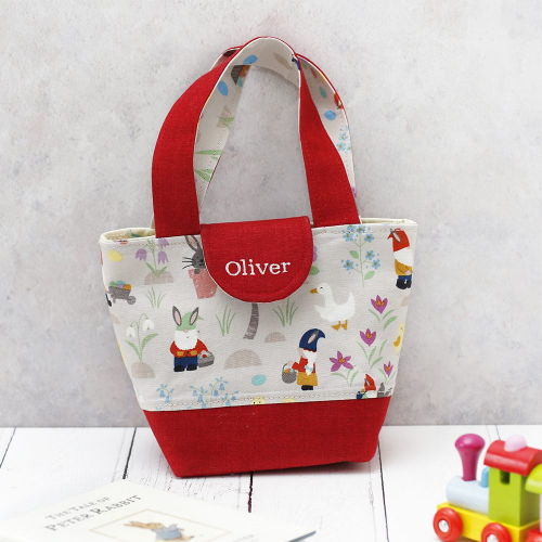 Childs toy handbag with egg collecting Easter theme